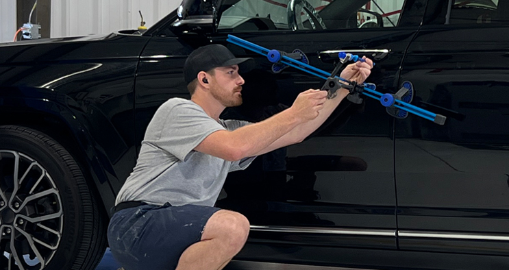 Paintless Dent Repair (PDR) Explained: Cost, Process, & How It Can Benefit You